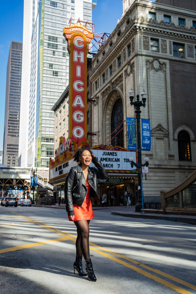 Aris Mendoza stands on a street outside of the Chicago theater