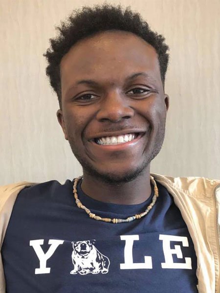 Richard headshot wearing Yale t-shirt